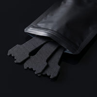 Pochette SomnIQ et bandelettes nasales noires — packshot Série 01