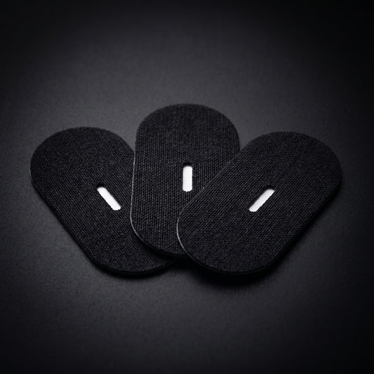 Tape bouche SomnIQ — patch ovale noir avec fente de ventilation centrale